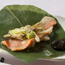 Grilled Yashio trout served on a magnolia leaf